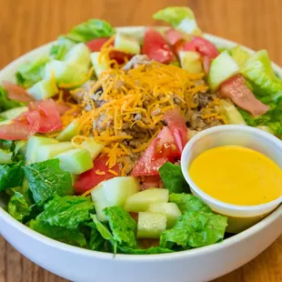 Big Spanish Salad. Brown Rice, Chicken breast, black beans with all the salad toppings.