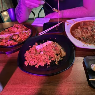 Sizzling buldak (left) kimchi friend rice (center) tteokbokki(right)