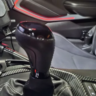 Shifter from Grey to Black Painted Top , Silver Bar above the leather boot and even the Shifter Trigger