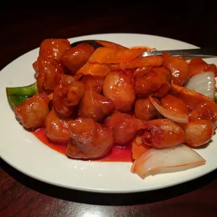 a plate of stir fried chicken