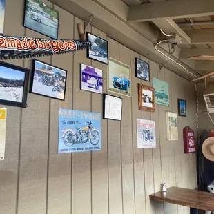 a variety of posters on the wall