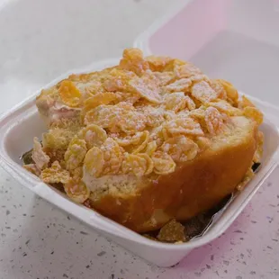 Sweet bun with vanilla custard and Frosted Flakes