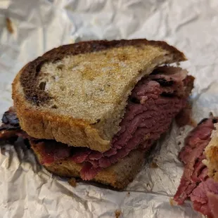 Corned beef and pastrami sandwich.   Morty&apos;s Sandwich and Wrap Board with 2 Meat Combo