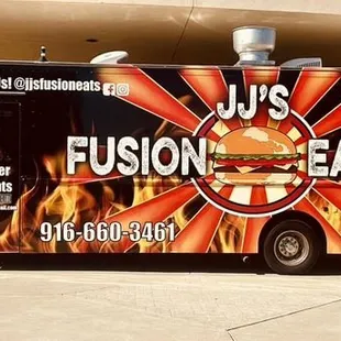 a food truck parked in front of a building