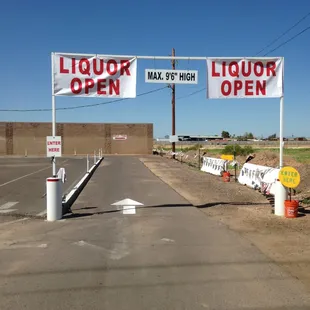 a liquor open sign