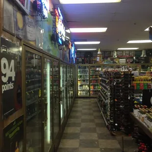 an aisle in a liquor store