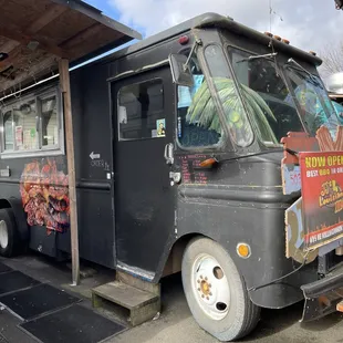 a food truck parked in front of a building