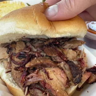 Brisket Sandwich served w/ side and Cornbread Muffin ($12)