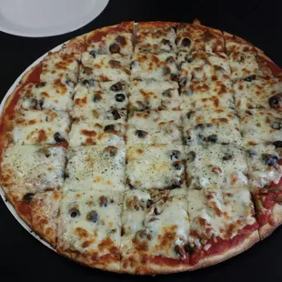 Mushroom and olive pizza.