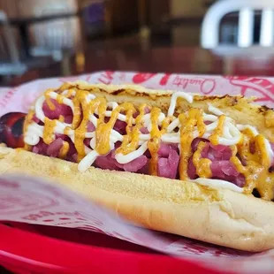 Built my own, hot blonde mustard,  mayo and pickled red onions.  IG: poprockphotography