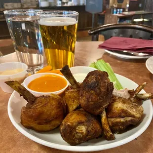 FAVORITE WINGS ANYWHERE No, these aren&apos;t lamb skewers, but balled plump juicy rotisserie legs.