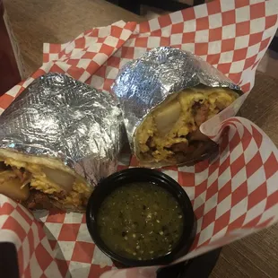 JJ&apos;s Breakfast Burrito, served with Al Pastor as the meat selection.  And their Verde sauce is on point