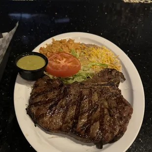 New York steak plate with rice and beans