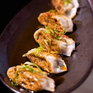 a plate of dumplings