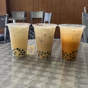 three drinks on a table