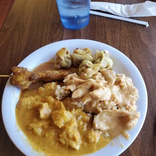 Yellow curry, panang curry, chicken satay, fried rice and steamed dumplings.