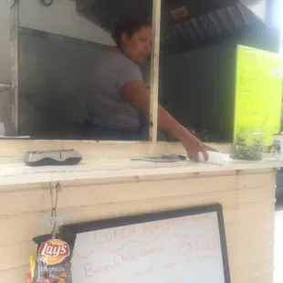 a woman at a food truck