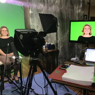 JL Images shooting a training program for a corporation using a teleprompter and green screen.