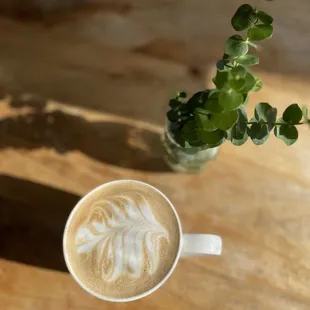 a cup of coffee on a table