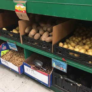 a display of potatoes and other vegetables