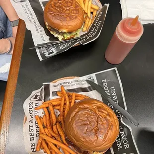 Bacon Avocado Burger with fries and BBQ Burger with sweet potato fries!