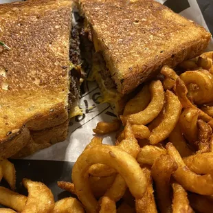 Patty melt with curly fries