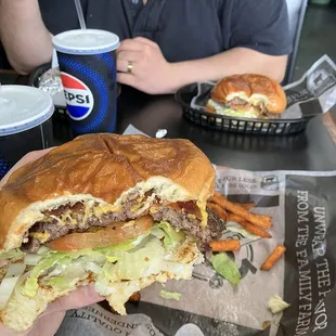 The regular cheeseburger, bacon cheeseburger, and sweet potato fries