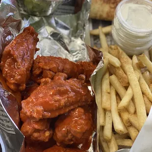 Traditional Hot Wings come with a lil side salad and fries