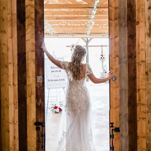 One of our favorite shots is our beautiful brides in our big venue doors!