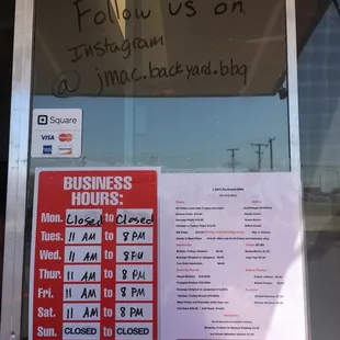 a business hours sign