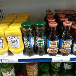 Some well-known items (yellow mustard, and La Choy stir fry sauces). Then there's the seaweed salad in between.