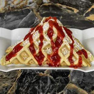 Waffle with strawberry sauce