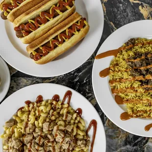 Cinnamon roll, hot dog, jerk steak rice plate, bbq chicken mac plate (from the left)