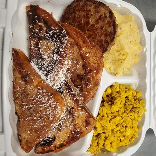 Gluten free french toast meal, beyond sausage, tofu eggs, and yellow grits.