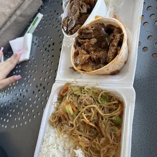 two take out containers of food