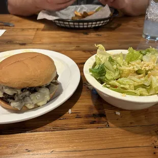 Mushroom Swiss Burger and side salad.