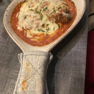 a spatula of lasagna