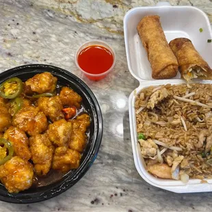 General Tso&apos;s chicken, egg rolls, and house fried rice