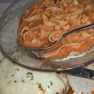 Eggplant Parm. Vodka sauce on the pasta.
