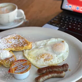French Toast, Eggs, and Sausage Breakfast Special. $9.80 including tax