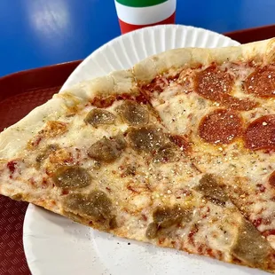 a slice of pepperoni pizza