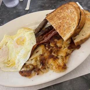 2 egg, 2 sausage, 2 bacon breakfast and the star of the show, these home fries possibly best I&apos;ve ever had
