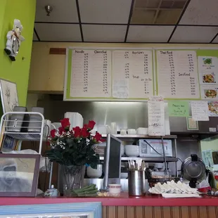 menus on the wall of a restaurant