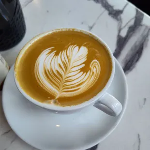 a cup of latte art