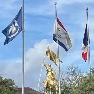 Beautiful gold Joan of Arc Statue - represents the beginning of Mardi Gras and Carnival Season