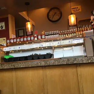 a counter with a clock above it