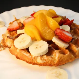 a waffle with fruit on top