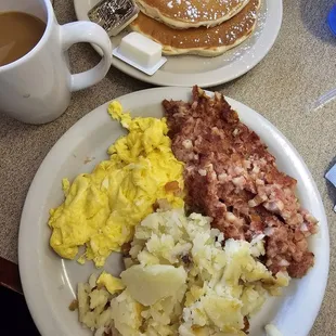 Cornbread hash, scrambled eggs,hashbrown, pancakes