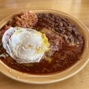 Joann's Ranch-O-Casados.  Stacked shredded beef enchiladas with red chile and topped with an egg.