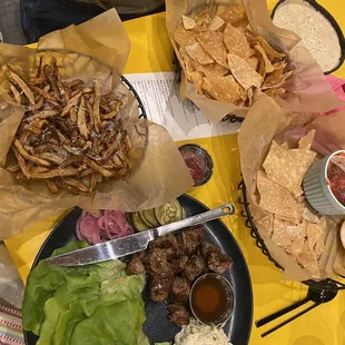 a table full of food and drinks